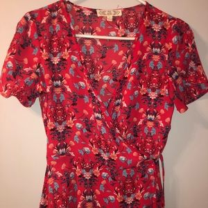 Women’s red and floral size small wrap top